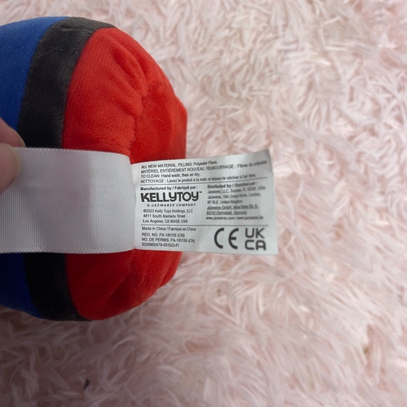 Squishmellow Plush Bear Toy in Red, Blue, and Yellow NWOT - Picture 3 of 4